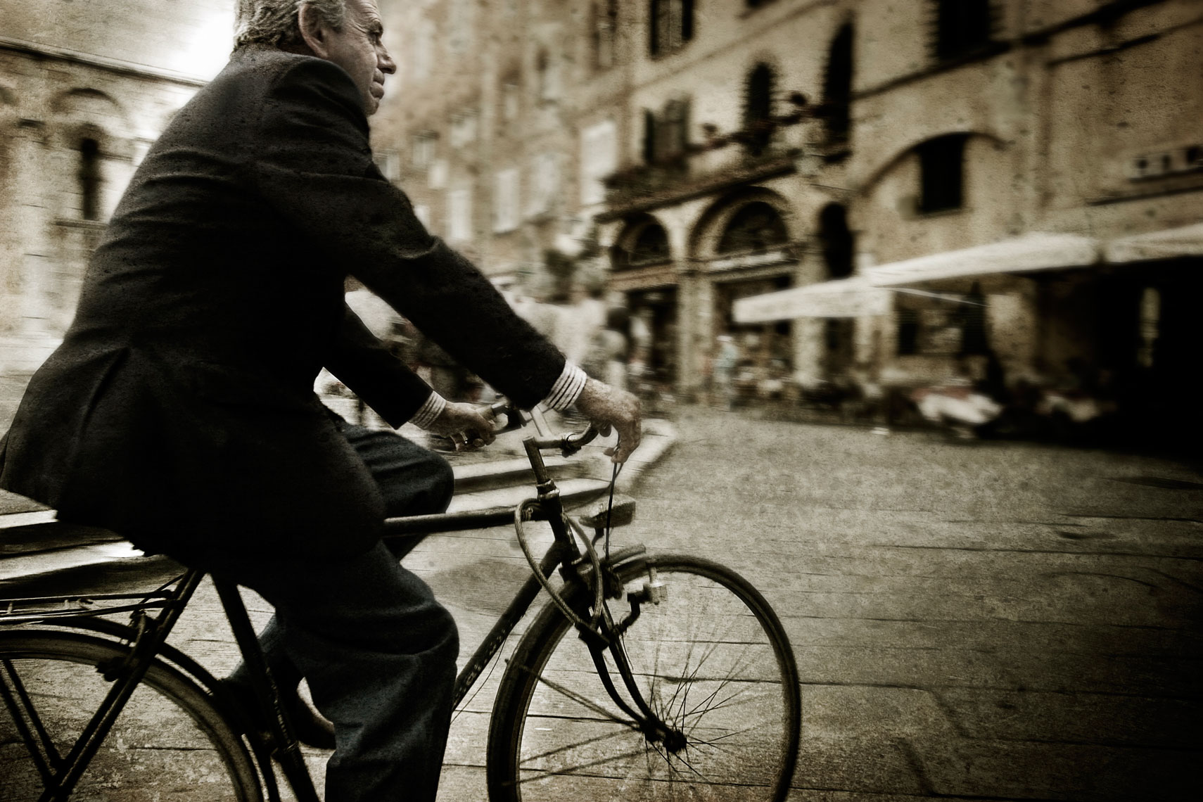 Portrait of Man on Bicycle in Italy