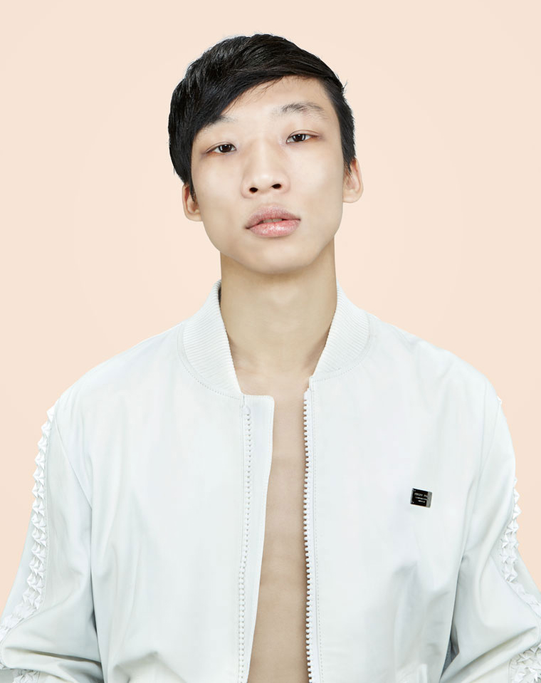 Portrait of Asian Man with white jacket
